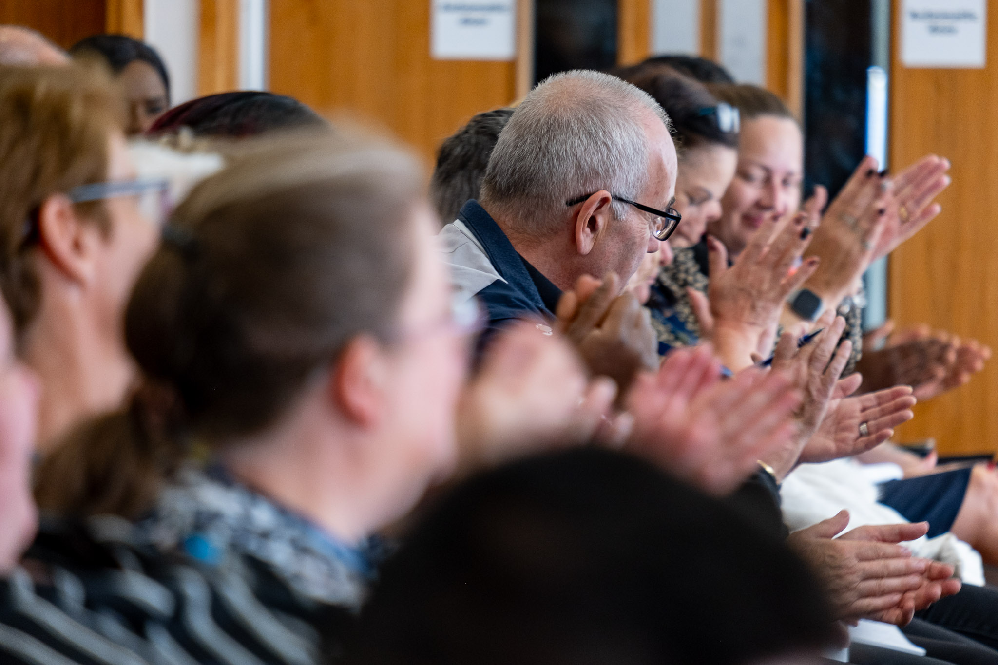 Care professionals networking at a regional care event in Epsom 2025