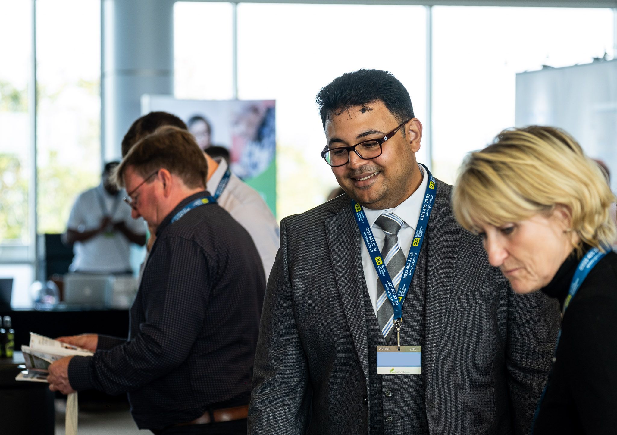 Visitors exploring Care Roadshow North West 2025 exhibition